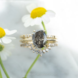 black oval diamond engagement ring